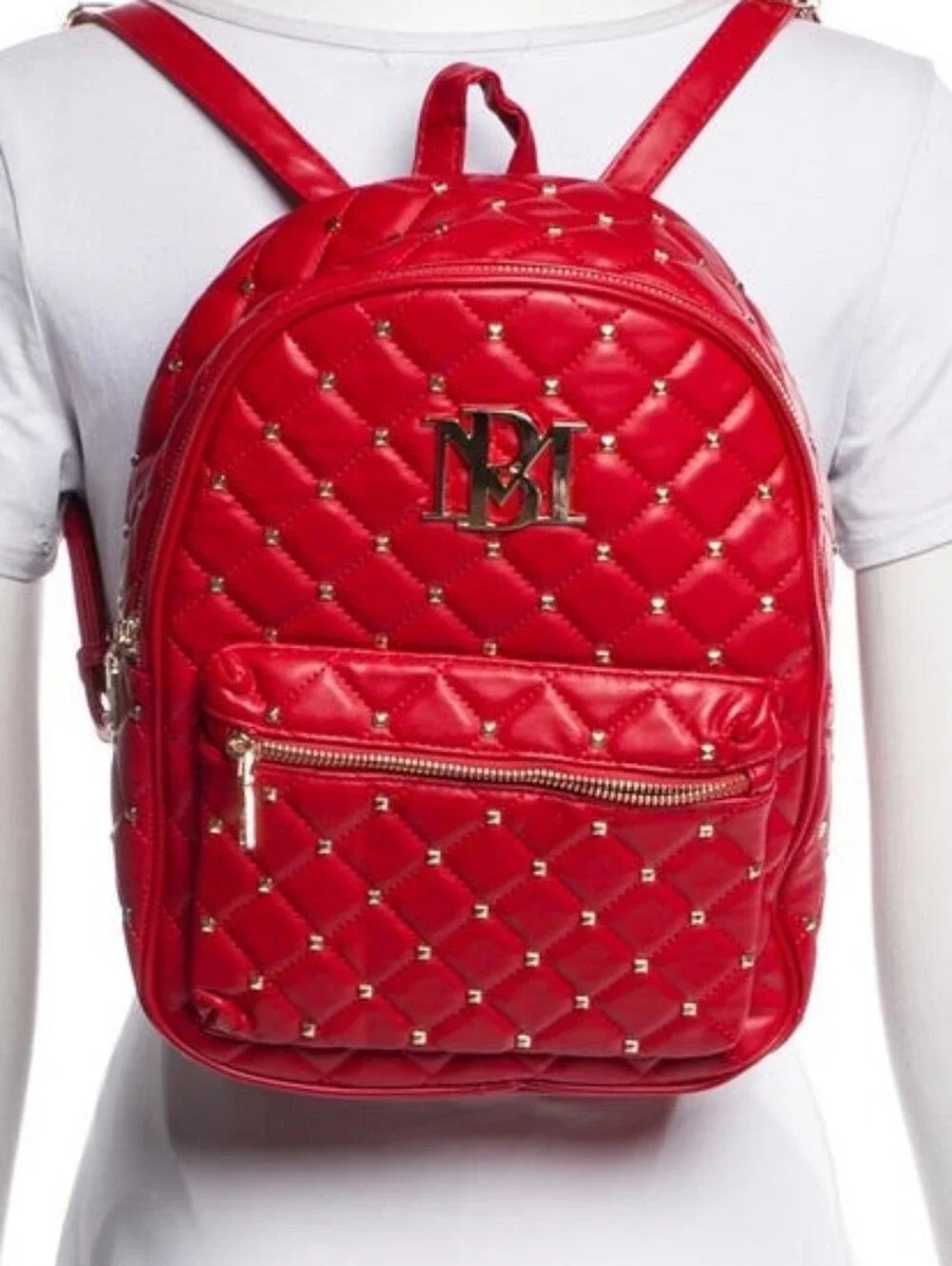 Badgley Mischka quilted vegan leather backpack featuring gold studded accents